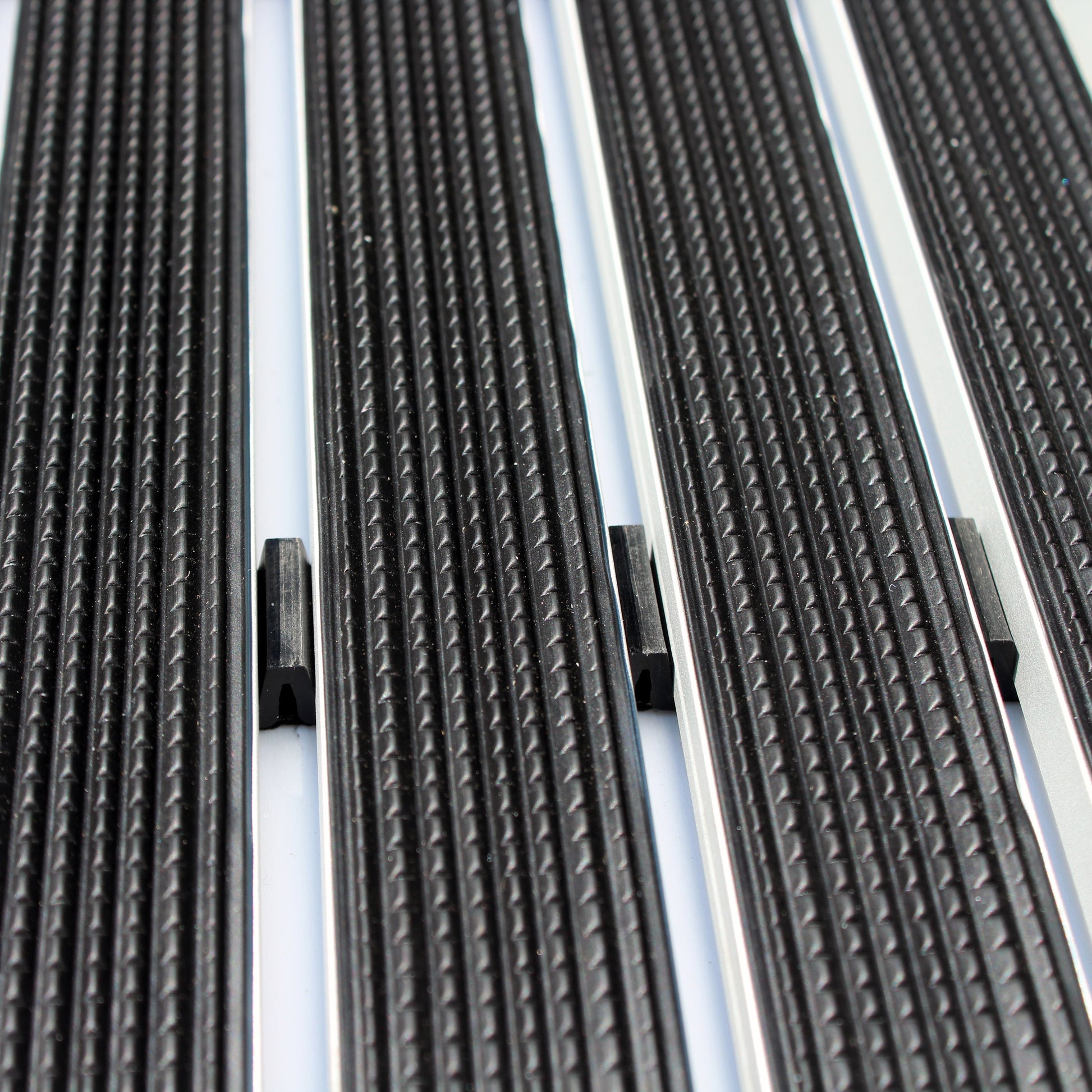 Zoomed-in view of the central area of the Hometex Premium Aluminium Outdoor Entrance Mat highlighting its durable aluminium surface