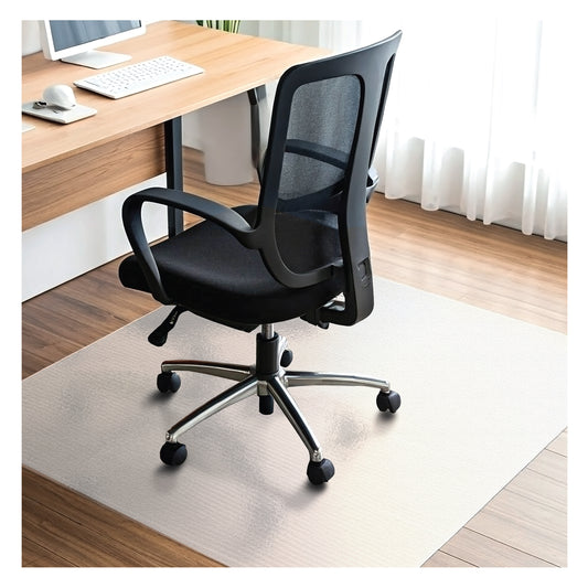 Lifestyle image of the Premium Polycarbonate Chair Mat – For Hard Floors in a home office setup with a caster-wheel chair at a computer desk.
