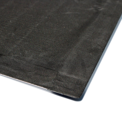 Close-up of the underside corner of the Hometex Premium Aluminium Indoor Entrance Mat, showing anti-slip backing 