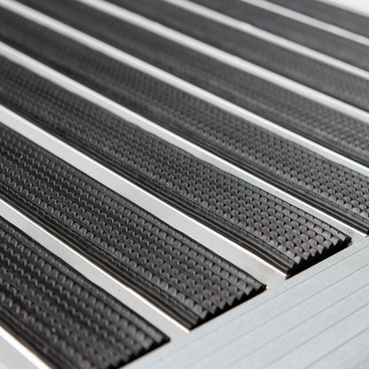 Angled close-up of the Hometex Premium Aluminium Outdoor Entrance Mat center, showcasing durable aluminium surface and anti-slip texture