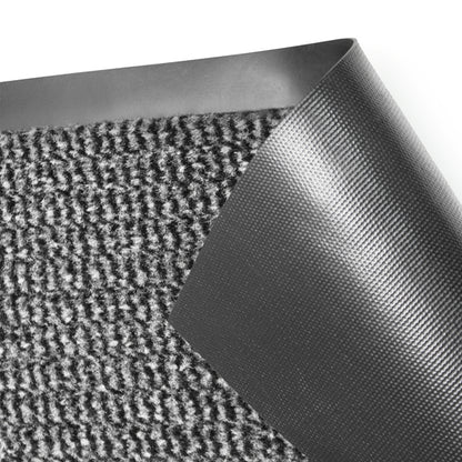 Close-up of a textured black mat with a white background