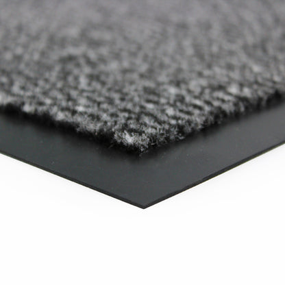 Close-up of a gray doormat with a black border on a white background