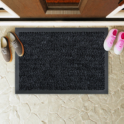 Hometex Solutions Universal Entrance Mat doormat on a stone floor with shoes on either side