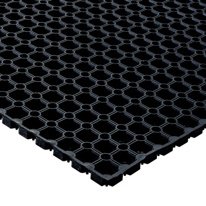 A close up of the Hometex All Seasons Outdoor Entrance Mat, zoomed in on the corner of the mat showing the durability of the rubber